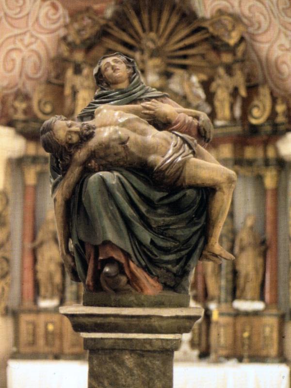 Pietà Statue of Our Lady of Sorrows with wounded Jesus,and main altar, year 1674