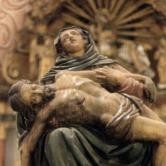Pietà Statue of Our Lady of Sorrows with wounded Jesus,and main altar, year 1674